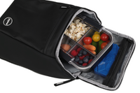 Black modular insulated front section lunch bag with compartments containing snacks on a white background