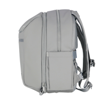 Gray modular backpack with multiple zippers on a white background. Zipper mechanism visible to detach front insulated section. 