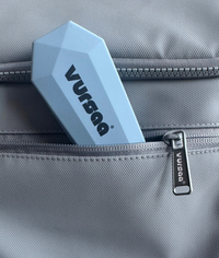 Vursaa Travel Utensil Set poking out of the Vursaa Orginal Backpack Pocket