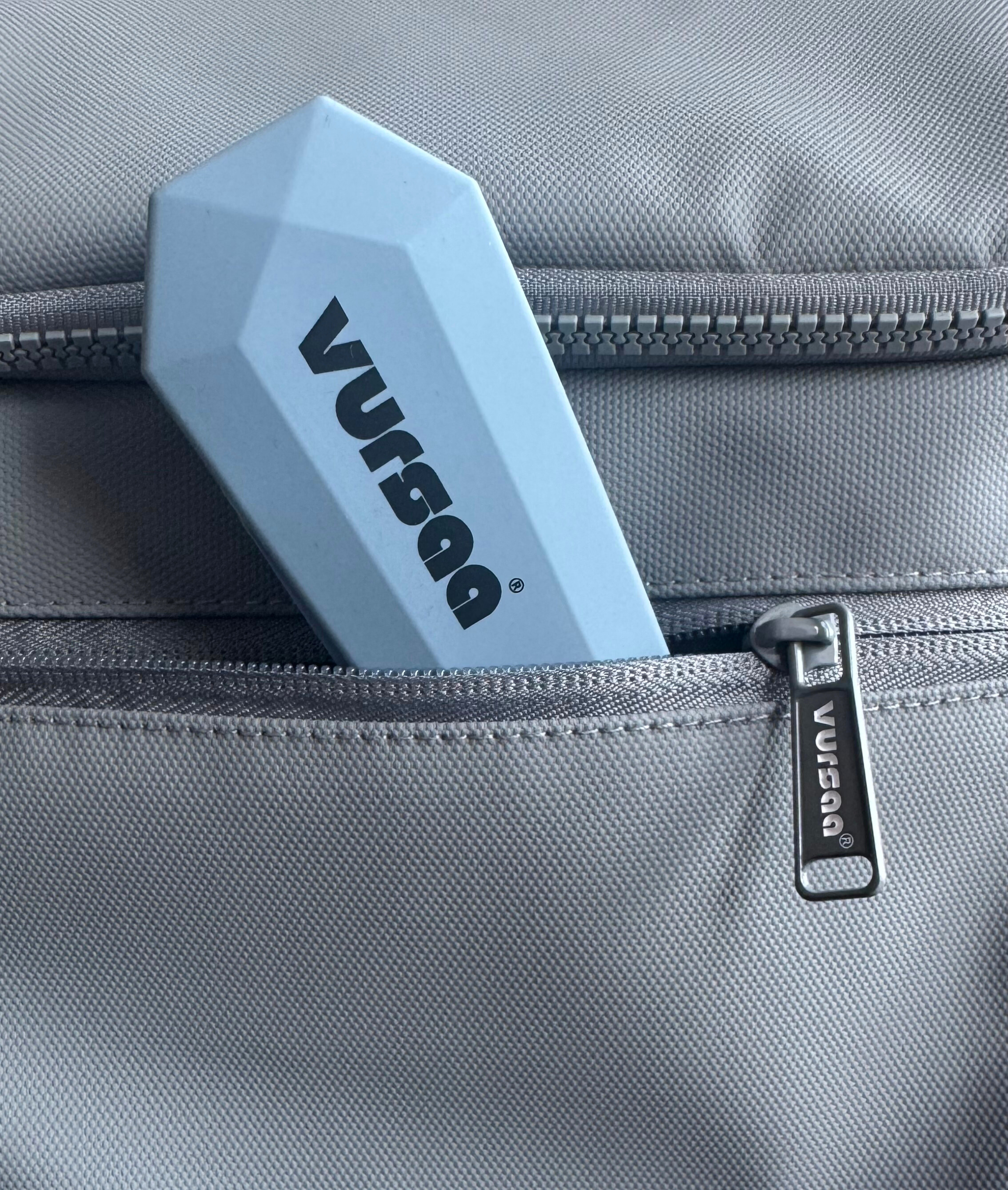 Vursaa Travel Utensil Set poking out of the Vursaa Orginal Backpack Pocket