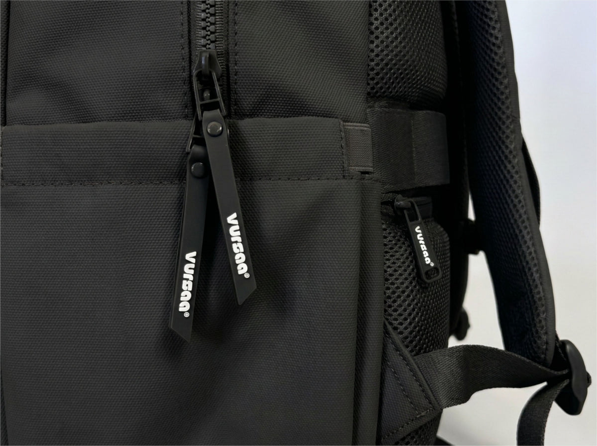 side profile with logo on zips and water bottle holder